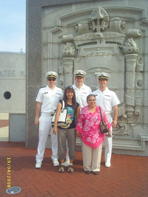Remaning photos all show Ann or Nanta and Ann posing in front of the Naval Academy with cadets (students from the Academy).  In one of the photos, a cadet hugs Ann.